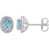 Sterling Silver Sky Blue Topaz & .025 CTW Diamond Earrings - Siddiqui Jewelers